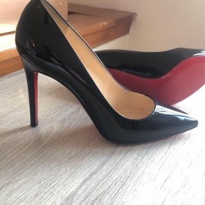 Almost new black louboutin pumps